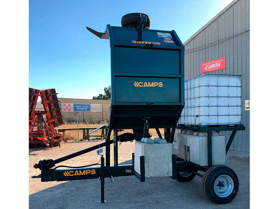 Camps compost turner processing a windrow
